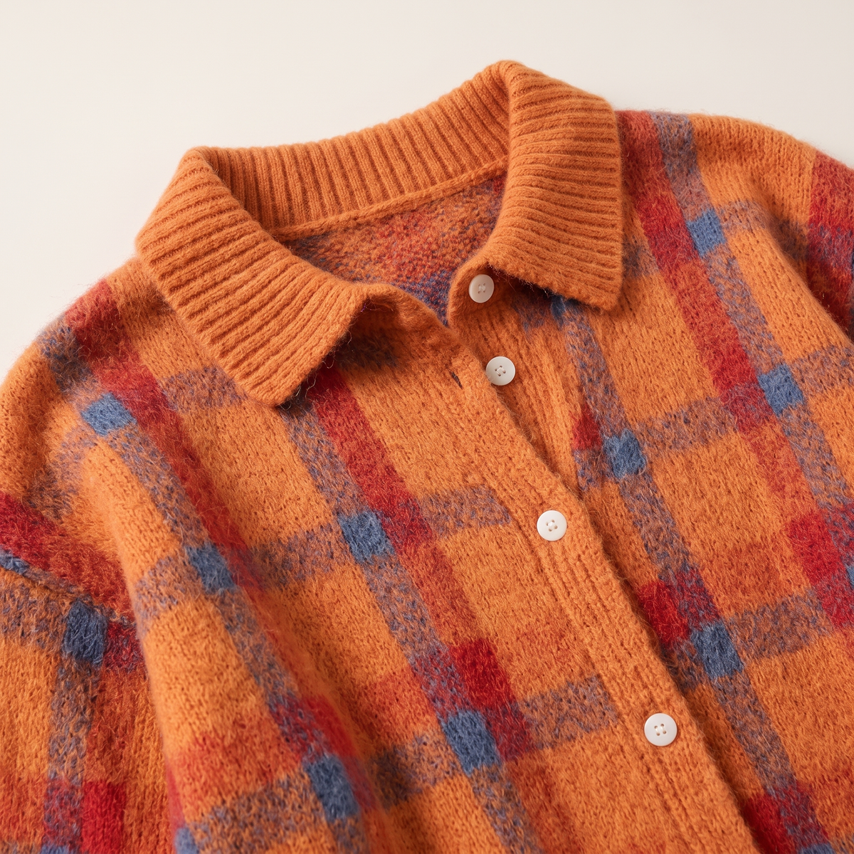 Olivia – Cardigan in maglia a quadri arancione