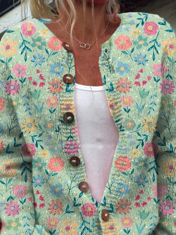 Cardigan con fiori pastello e alamari