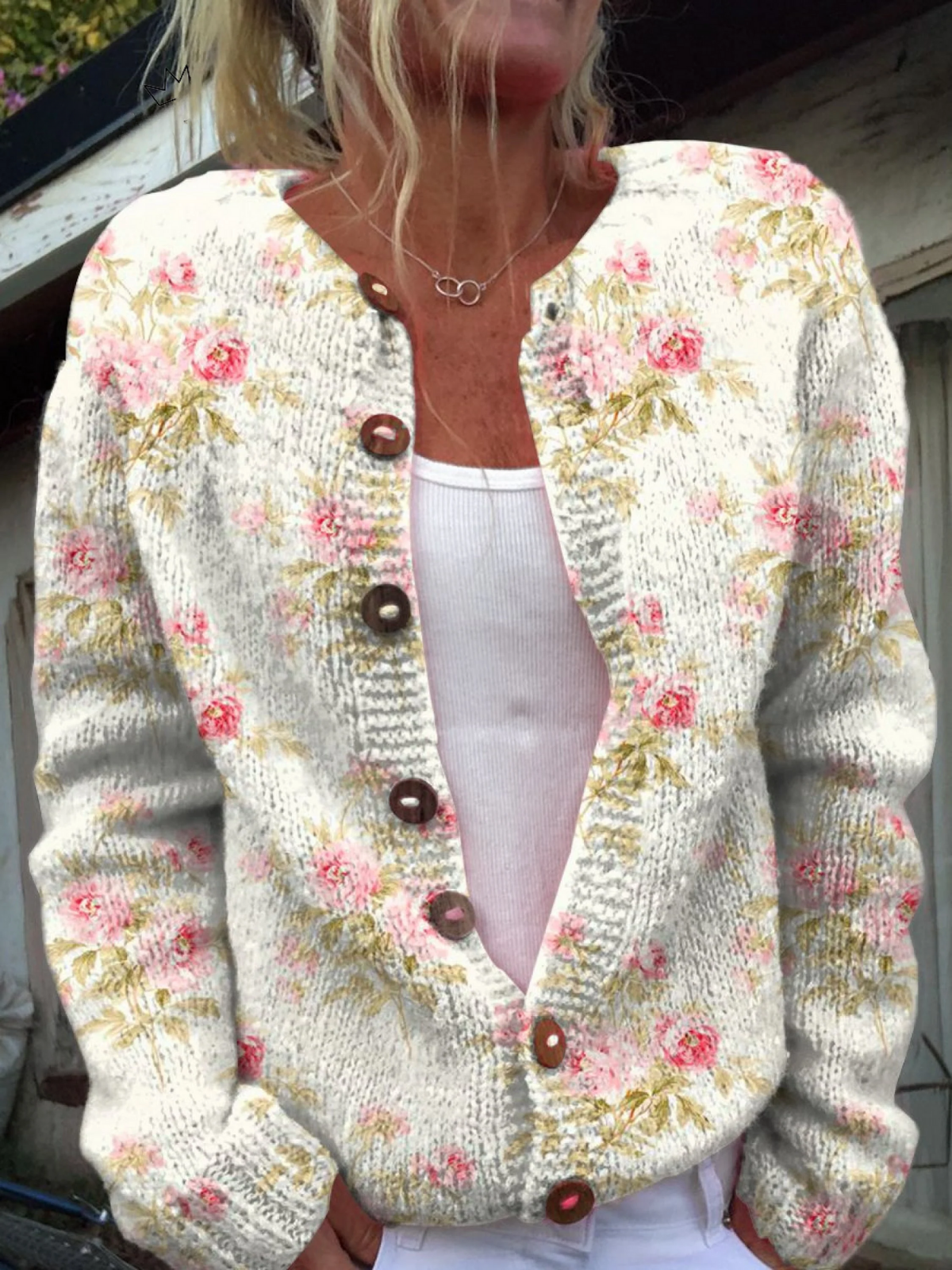Cardigan in maglia grossa con boccioli rosa
