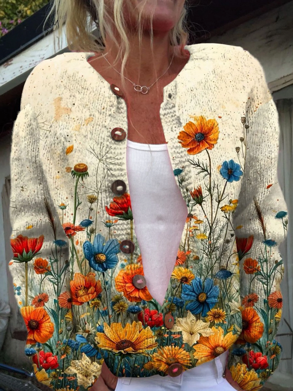 Cardigan con fiori di campo effetto dipinto