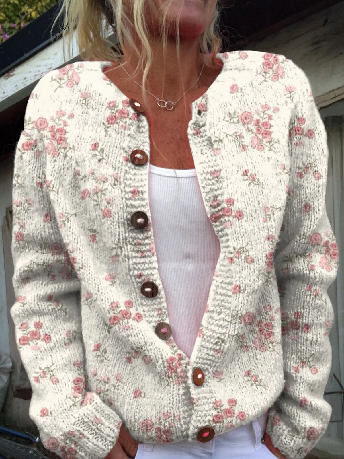 Cardigan in maglia con rose rosa