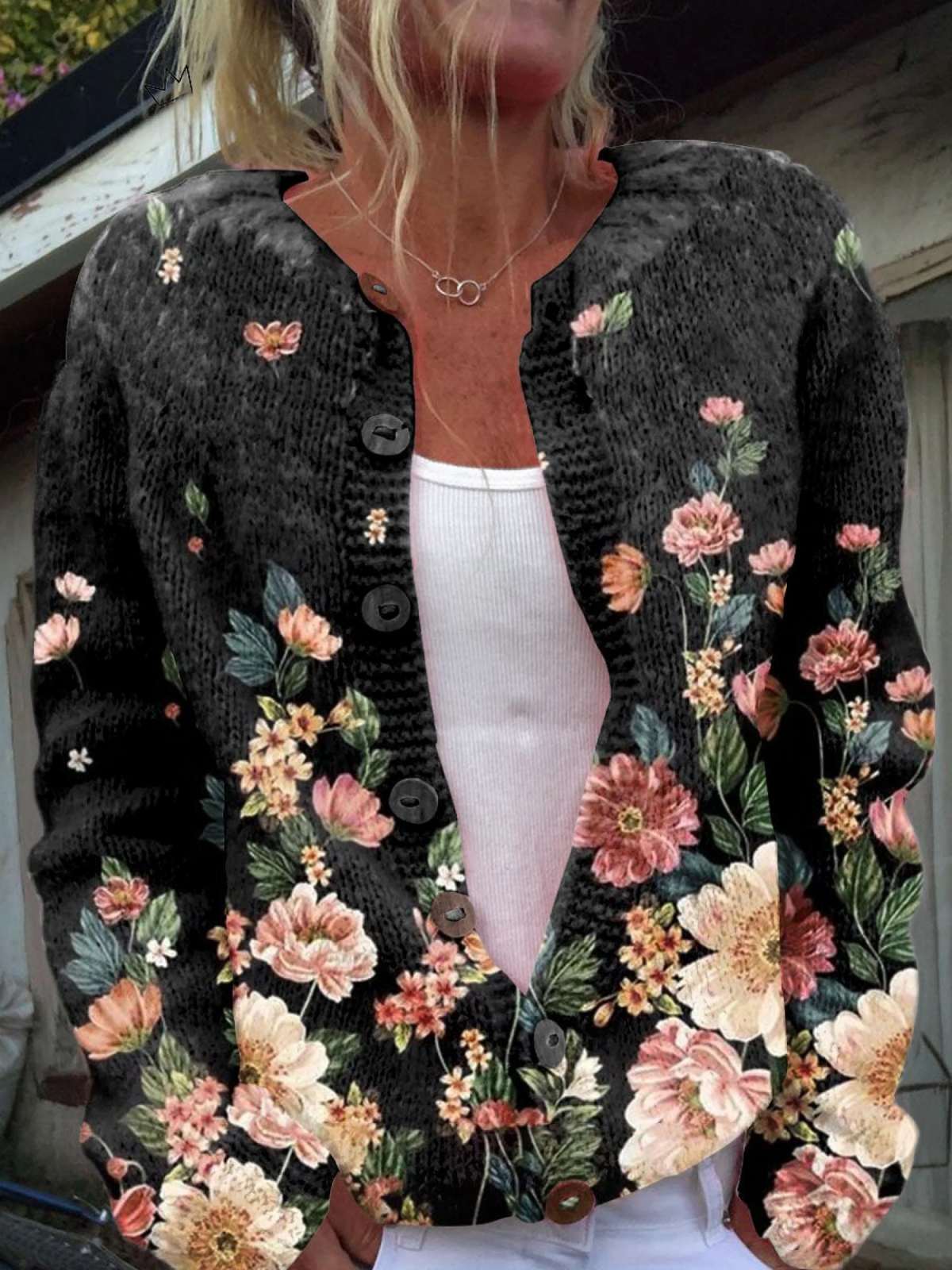 Cardigan nero con stampa botanica